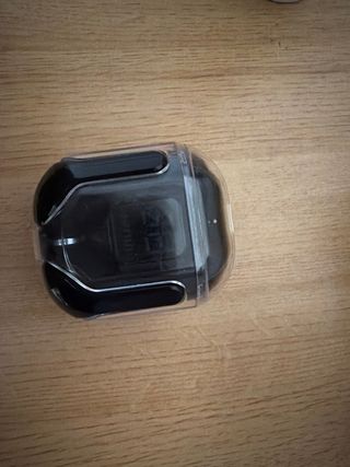 Auriculares Negros Airpods.