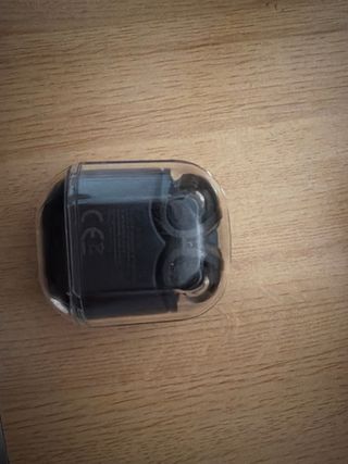 Auriculares Negros Airpods.