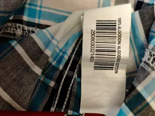 Camisa cuadros manga corta.