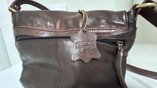 Bolso piel marrón con bolsillo