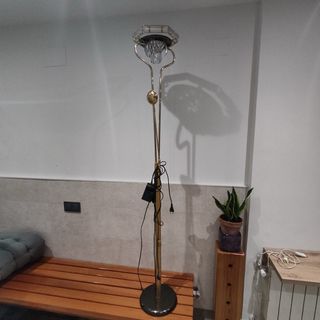 Lampada da terra dorata e trasparente con regolatore