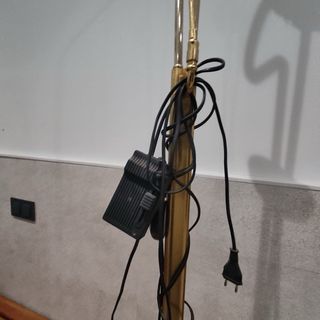 Lampada da terra dorata e trasparente con regolatore