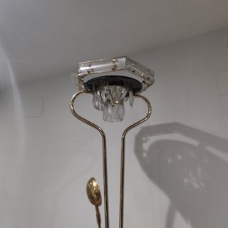 Lampada da terra dorata e trasparente con regolatore