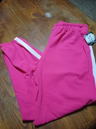 Pantaloni tuta rosa con banda laterale