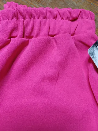 Pantaloni tuta rosa con banda laterale