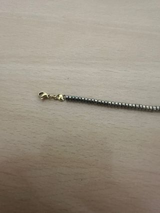 Pulsera dorada trébol