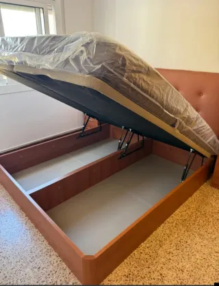 Canapé abatible y colchón gris