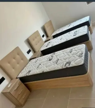 Canapé abatible y colchón gris