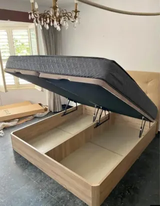 Canapé abatible y colchón gris