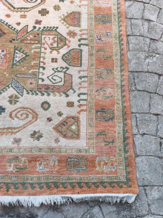 Alfombra grande de lana beige y naranja
