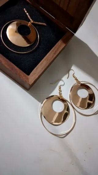 Set collana e orecchini cerchi oro