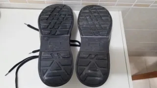 Scarpe antinfortunistiche nere e verdi