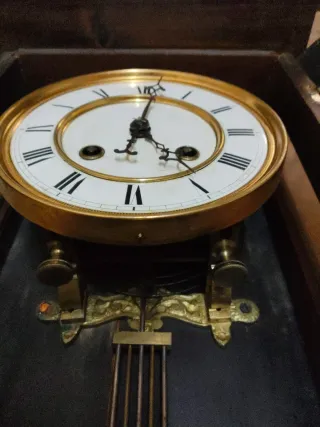 Reloj de péndulo antiguo