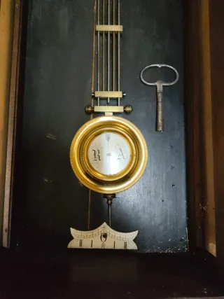 Reloj de péndulo antiguo