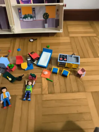 Casa Playmobil con jardín y figuras