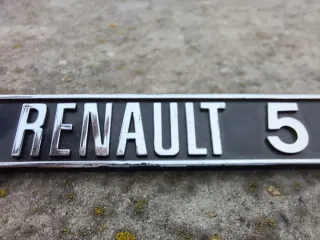 Renault 5 - Anagrama Salpicadero PIEZA ORIGINAL