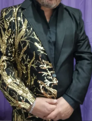 Chaqueta de espectáculo negra y dorada Talla L