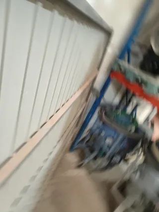 Puerta corredera  Alt.2,50m Ancho 2,40m.