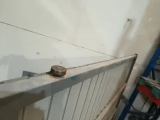 Puerta corredera  Alt.2,50m Ancho 2,40m.