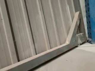 Puerta corredera  Alt.2,50m Ancho 2,40m.