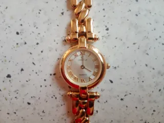 Reloj dorado Cristian Lay