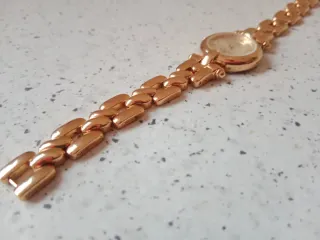 Reloj dorado Cristian Lay