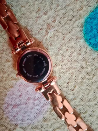 Reloj dorado Cristian Lay