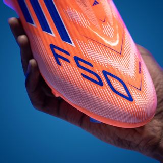 Botas de fútbol F50 League Laceless FG/MG Adulto Naranja