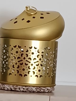 Portavelas metálico dorado