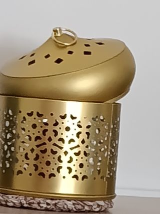 Portavelas metálico dorado