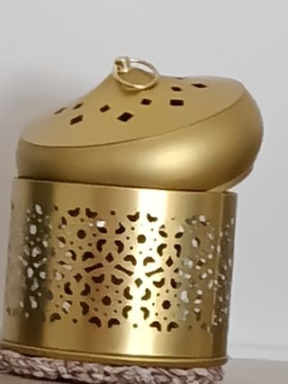 Portavelas metálico dorado