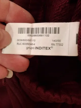 Pantaloni tuta grigi e bordeaux