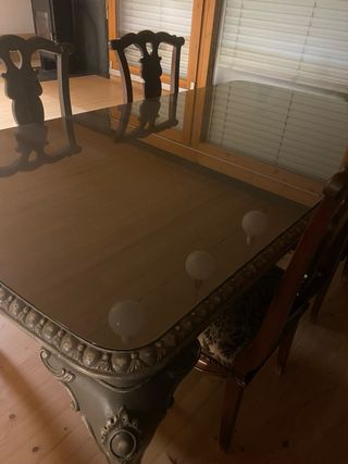 Mesa de comedor de cristal y madera