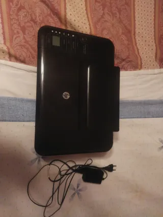 Impresora HP Negra falta ponerle la tinta