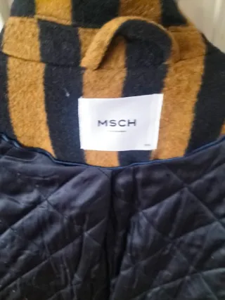 Abrigo rayas negro y marrón