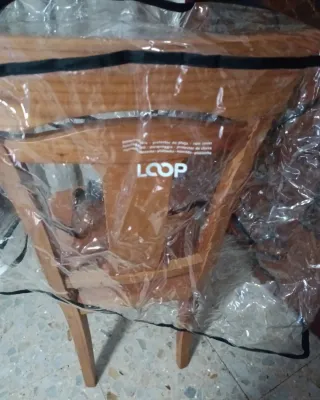 Protector de lluvia para silla de carro de bebé.