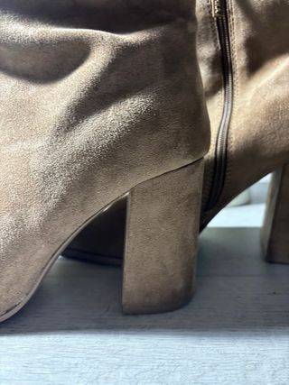 Botas altas ante tacón