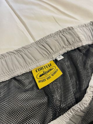 Pantalones Corteiz Reflectantes Grises y Blancos