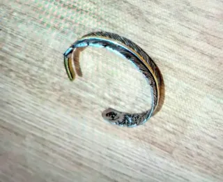 Pulsera diseño pluma oro y plata