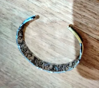 Pulsera diseño pluma oro y plata