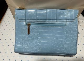 Bolso azul tejido efecto piel