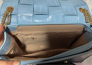 Bolso azul tejido efecto piel