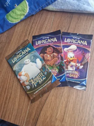 1 Azurite Sea, 2 Shimmering Skies Lorcana booster