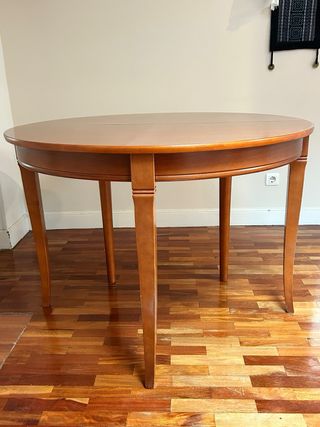 Mesa de comedor redonda extensible de madera