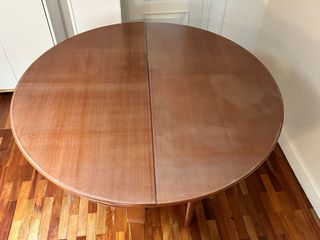 Mesa de comedor redonda extensible de madera