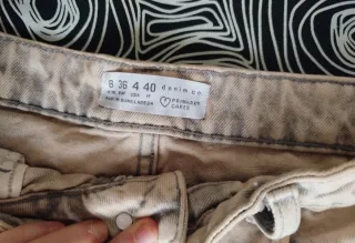 Shorts vaqueros desgastados beige y gris