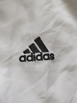 Giacca sportiva Adidas bianca e nera