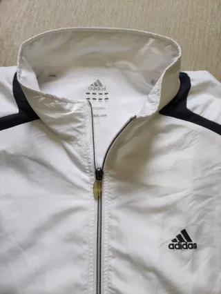 Giacca sportiva Adidas bianca e nera
