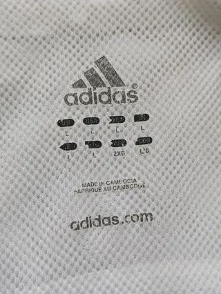 Giacca sportiva Adidas bianca e nera