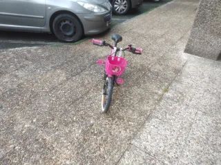 Bicicleta niña 16 rosa btwin+ruedines